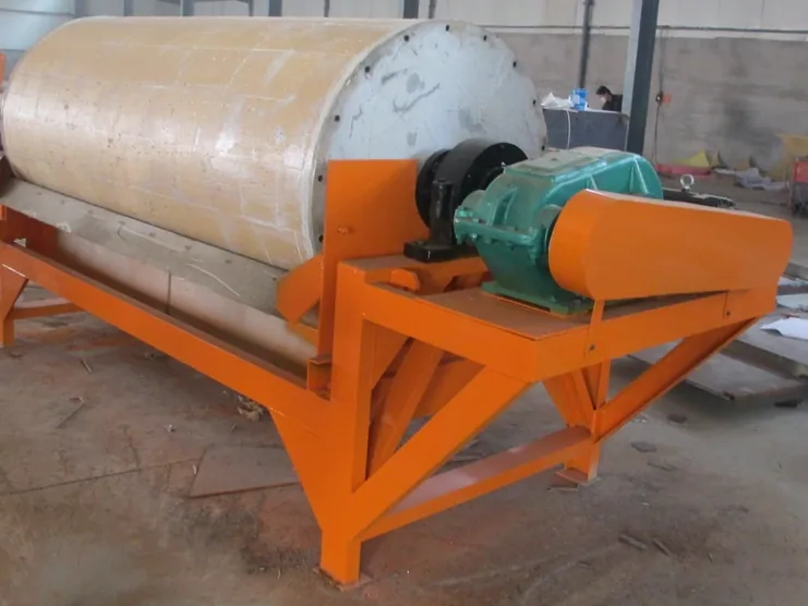 Drive-side view of a wet drum magnetic separator showing the drum, tank, bearing area and drive assembly.