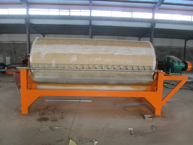Front view of a wet drum magnetic separator showing the drum, tank and drive side.